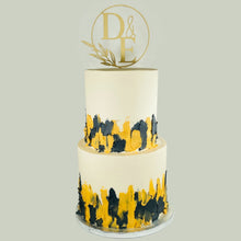 Load image into Gallery viewer, Two Tier Gold &amp; Black Cake
