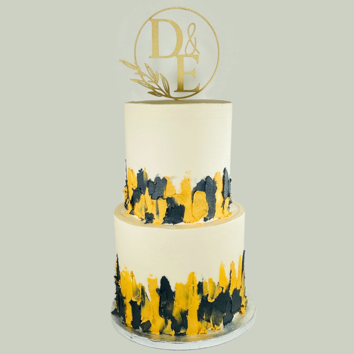 Two Tier Gold & Black Cake